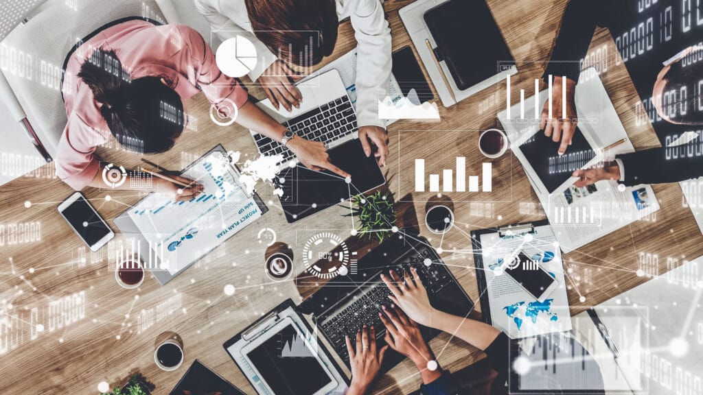 Dental practice team reviewing digital marketing and patient growth strategies